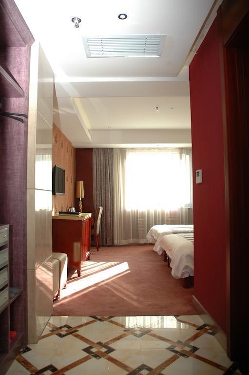 Harbin Yakelai Holiday Hotel Chambre photo