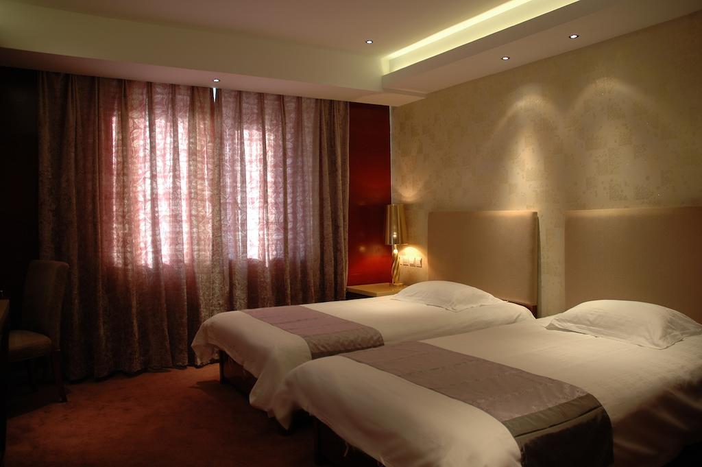 Harbin Yakelai Holiday Hotel Chambre photo